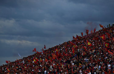 The tifosi cheer from the grandstands at the Imola GP