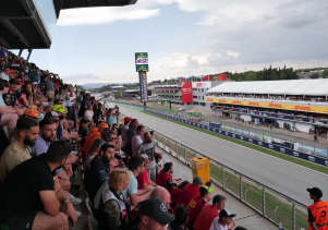 F1 fans on the Main Grandstand of Circuit de Barcelona-Catalunya overlooking the Main Straight