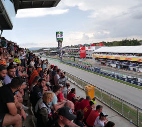 F1 fans on the Main Grandstand of Circuit de Barcelona-Catalunya overlooking the Main Straight