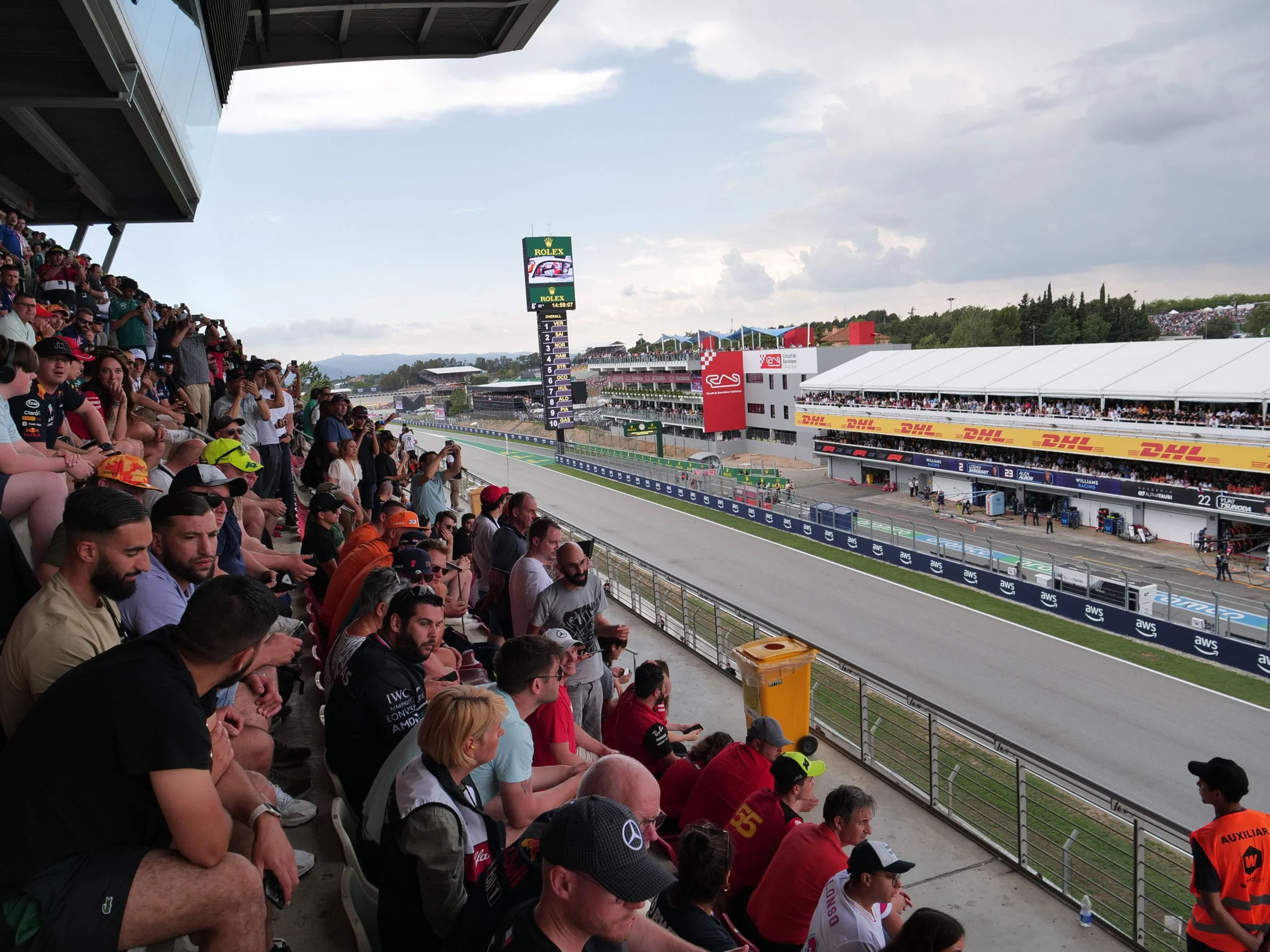 F1 fans on the Main Grandstand of Circuit de Barcelona-Catalunya overlooking the Main Straight