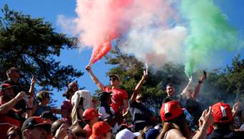 Green, white and red smoke on a grandstand of Monza