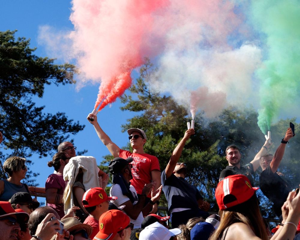 Green, white and red smoke on a grandstand of Monza