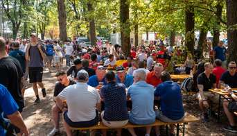 Fans enjoying a drink next to the track of Monza