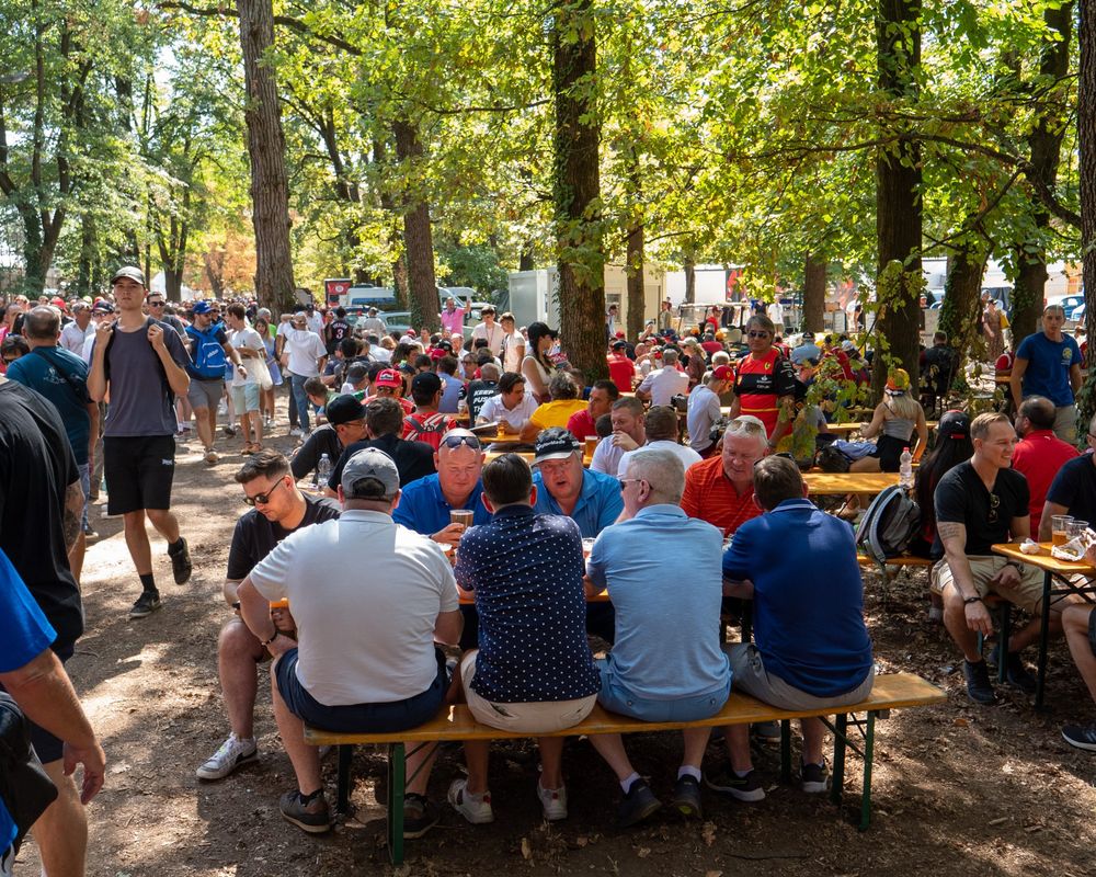 Fans enjoying a drink next to the track of Monza