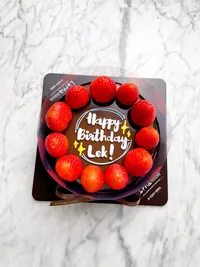 Strawberry surrounded on Vegan chocolate cake