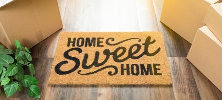 Door mat that reads Home Sweet Home