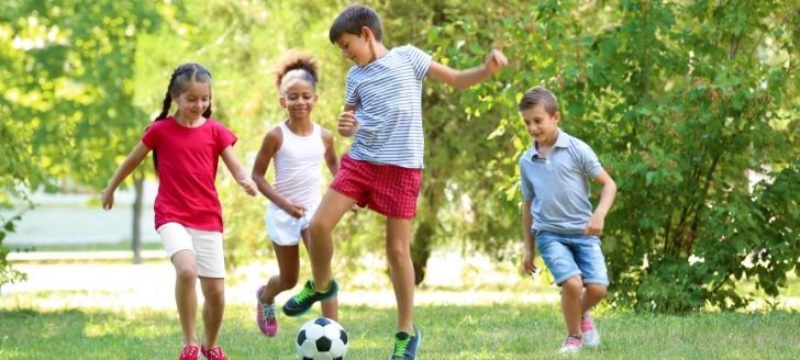 kids playing with a soccer ball