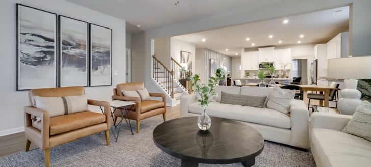 Family room with view of the kitchen and stairs