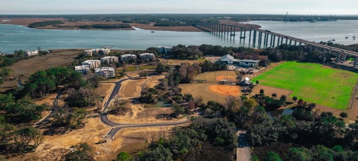 aerial view of construction site with water views