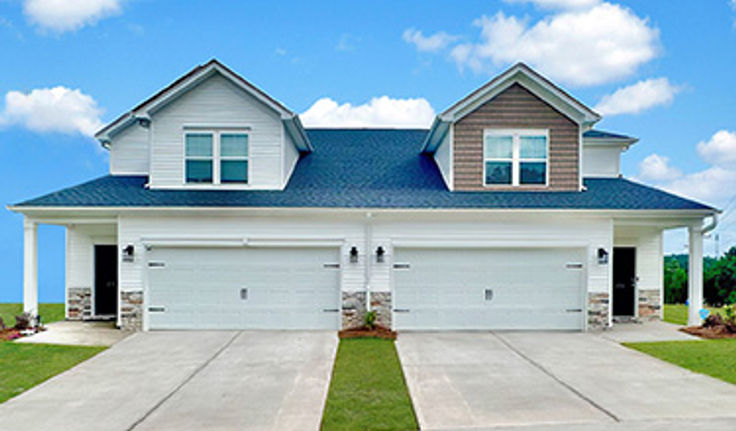 Street view of multiple townhomes at Parkland