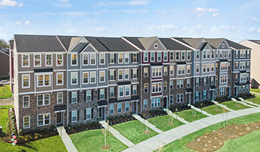 Mockup street view of townhomes in the Retreat at One