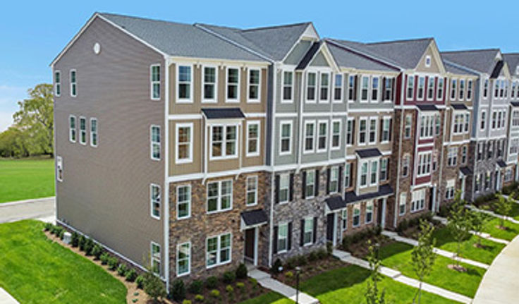 Street view of townhomes in the Retreat at One