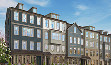 Exterior building view of The Tessa condo building at Village at Manassas Park