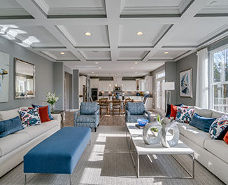 family room with coffered ceiling