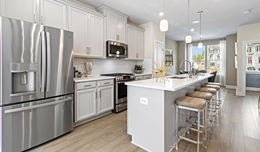 kitchen with large island and GE appliances