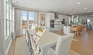 open dining area next to kitchen