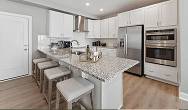open kitchen with peninsula island seating