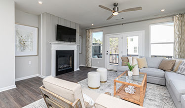 family room with door to rear deck