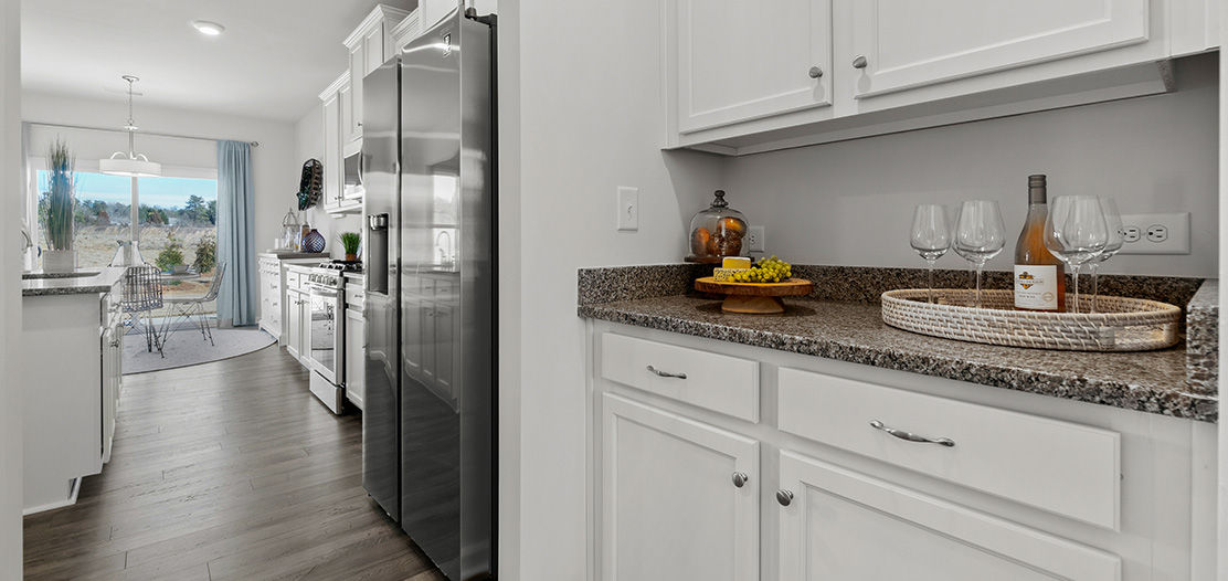 Kitchen with granite counter tops and dining nook