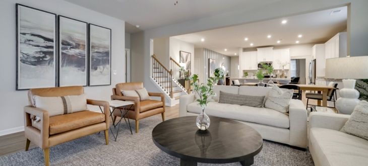 Family room with view of the kitchen and stairs