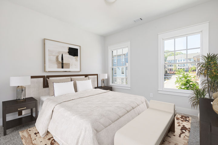 bedroom with bright windows