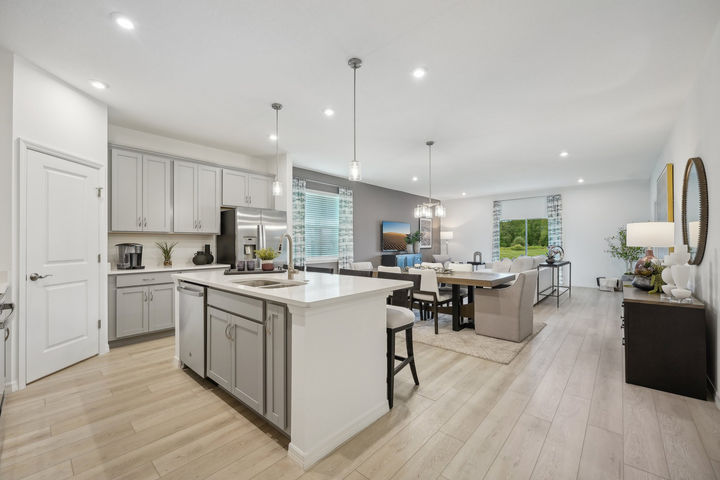 Kitchen, Dining, and Living of The Webber at Avalon Park Tavares