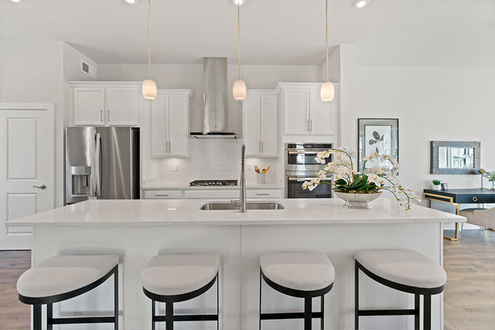 bright white kitchen with large island