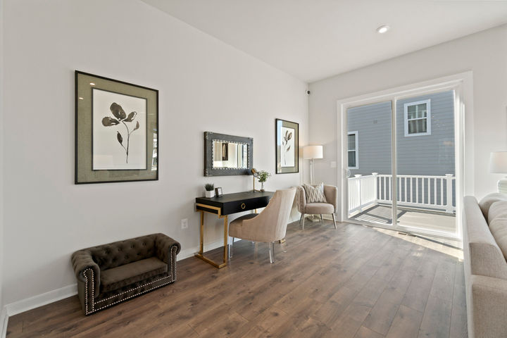 family room with sliding doors to rear deck