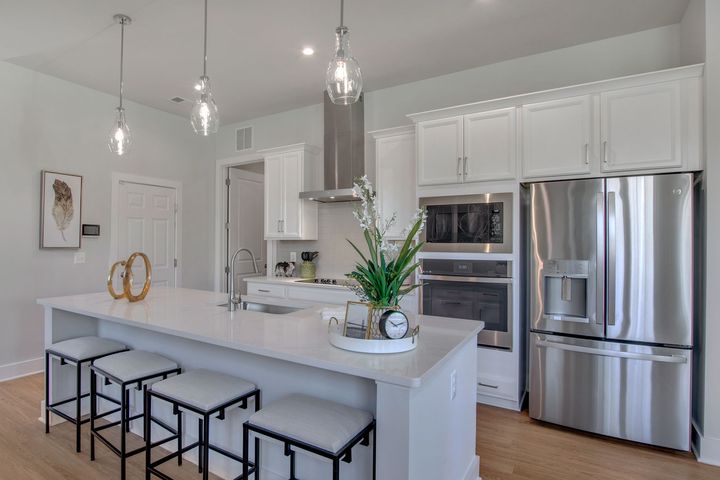 white kitchen with large island