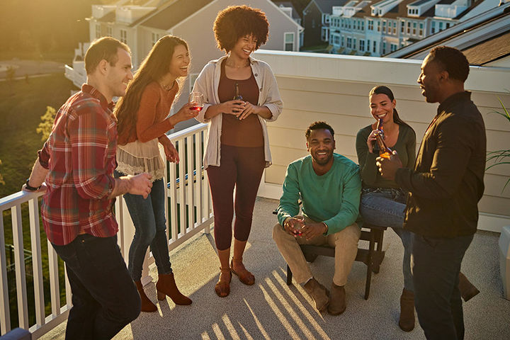 friends on rooftop terrace