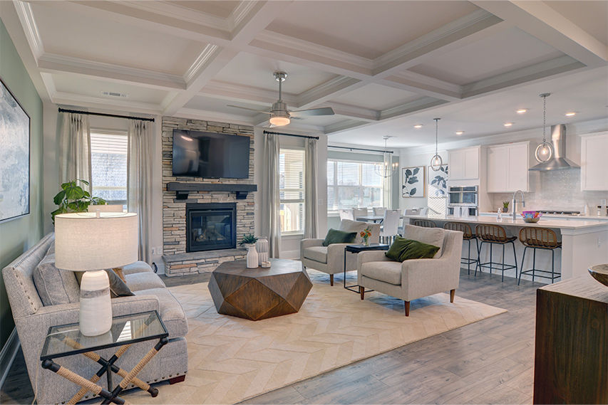 Living room with a stone fireplace