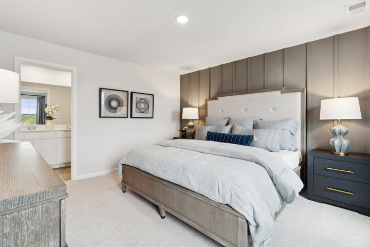 Spacious primary bedrooms with en suite bathrooms and spacious closets