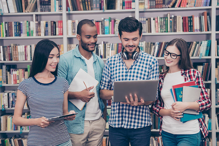 students studying at library