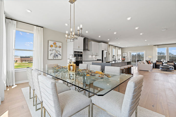 dining room flows to kitchen and family room