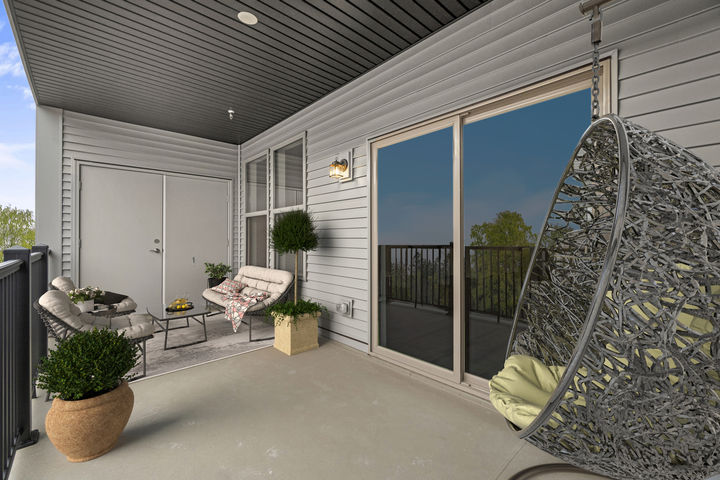 Rear balcony provides the perfect spot to enjoy your morning coffee
