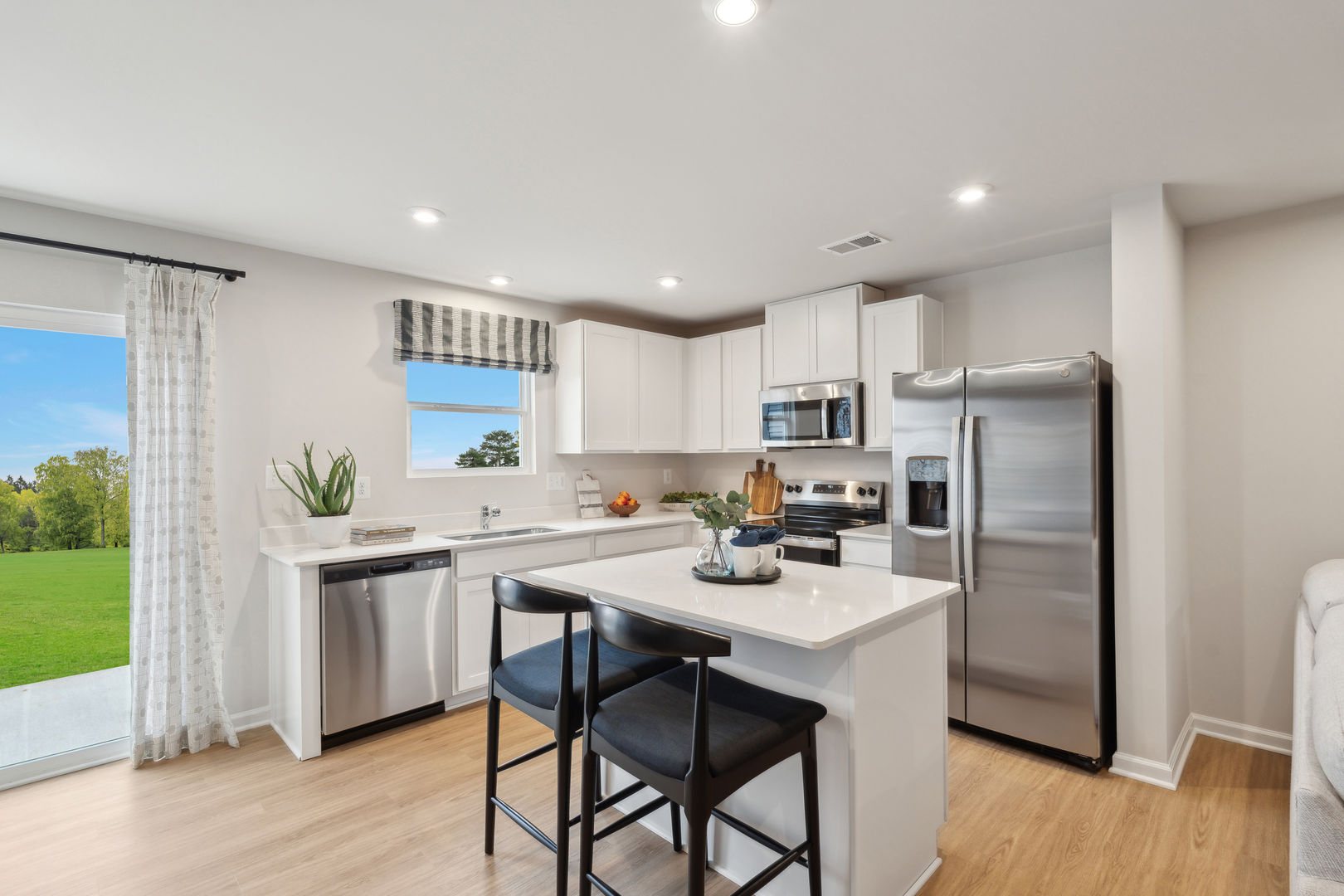 Light filled kitchens with designer inspired finishes