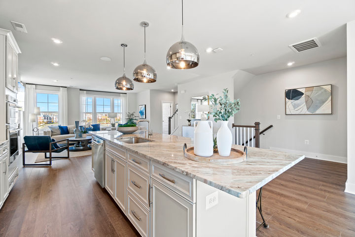 kitchen island with hanging light fixtures