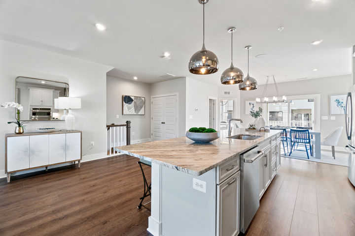 kitchen island with sink and dishwasher