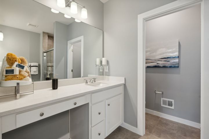 Primary Bathroom with Separate Vanities