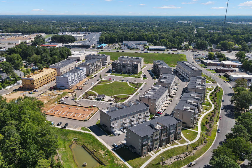 Aerial view of the townhomes and community space in West Broad Landing