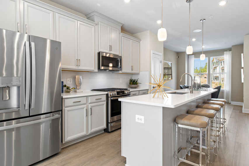 Oversized Kitchen Island, Oak Stairs, Lower Level Powder Room, Deck Off Main Level