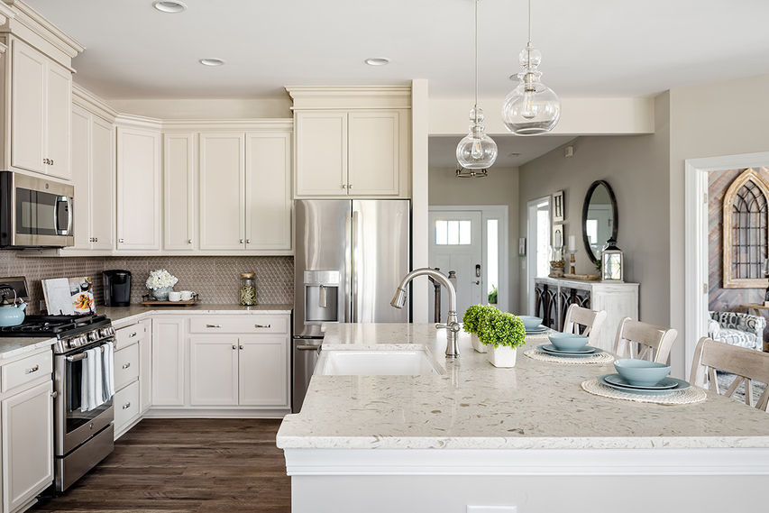 Large kitchen with an island and granite countertops