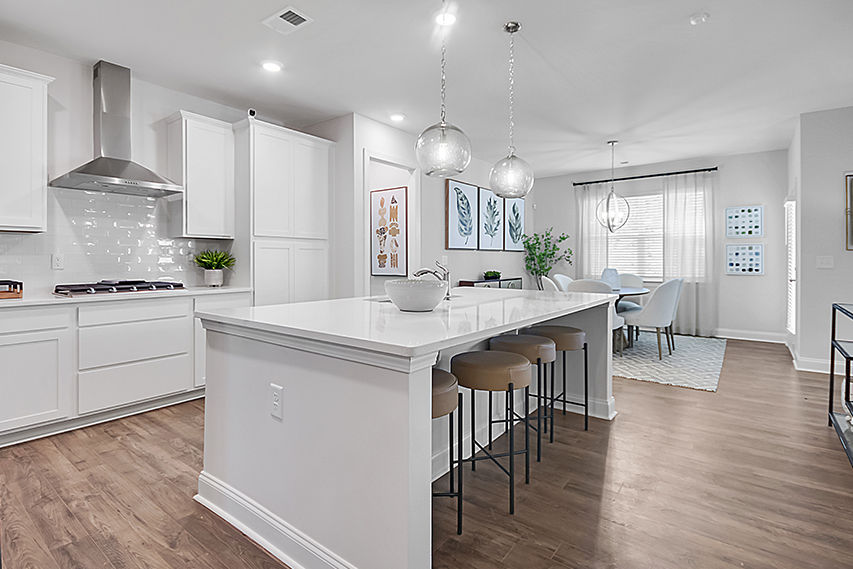 Kitchen with a large island and bar seating