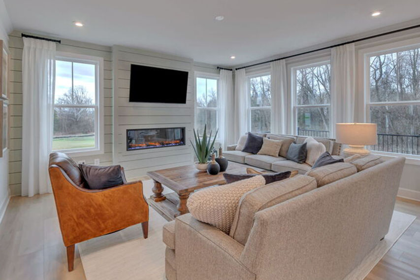open concept family room with bright windows