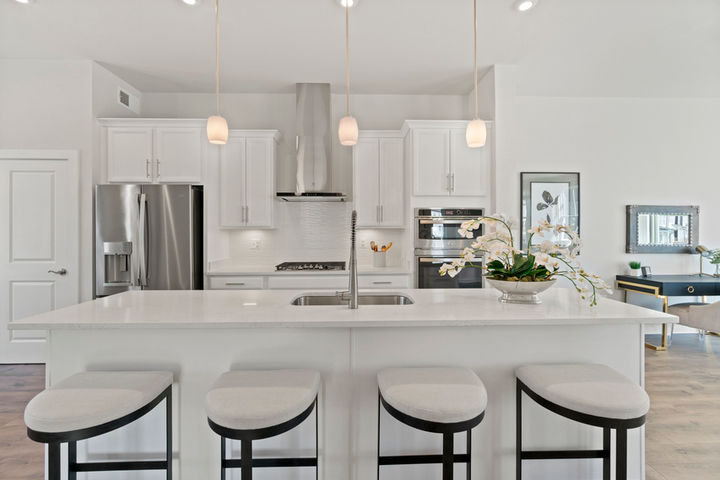 large island with stool seating in kitchen