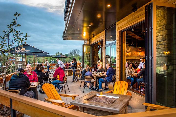 outdoor dining at restaurant in town center