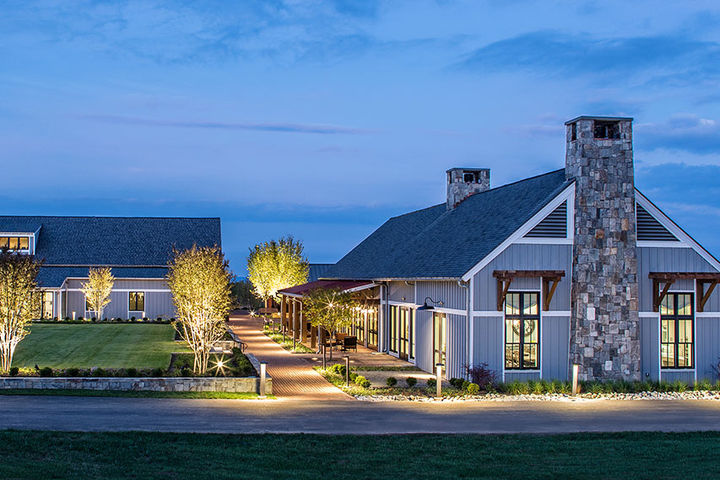 the shores club building with plentiful windows and fireplace