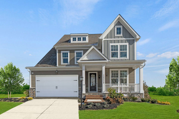 exterior home of the caswell model home at woods overlook at potomac shores