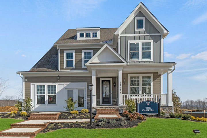 exterior home of the caswell model home at woods overlook at potomac shores