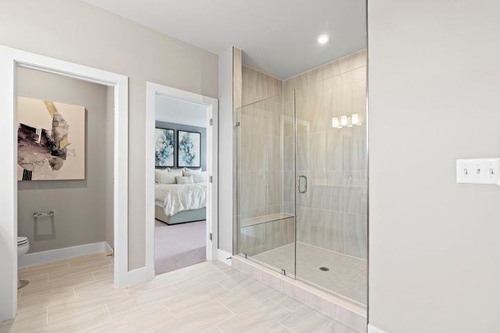 shower with bench in primary bath